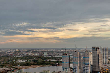 Bangkok, thailand - May 27, 2020 : Sky view of Bangkok with skyscrapers in the business district in Bangkok in the evening beautiful twilight give the city a modern style. Selective focus.のeditorial素材