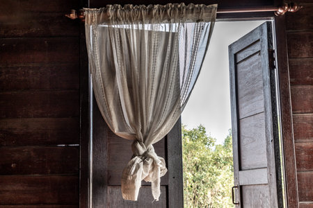 Textured background: Wooden pattern of Window and White lace curtains in traditional thai house,...