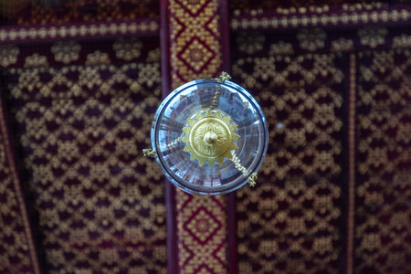 Bangkok, Thailand - Jun 19, 2020 : Beautiful lamp on the ceiling in The Temple of Emerald Buddha or...