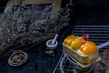 Traditional French sweet dessert : Mayomgchid tart on beautiful background. One piece, Delicious seasonal breakfast, Selective focus.の写真素材