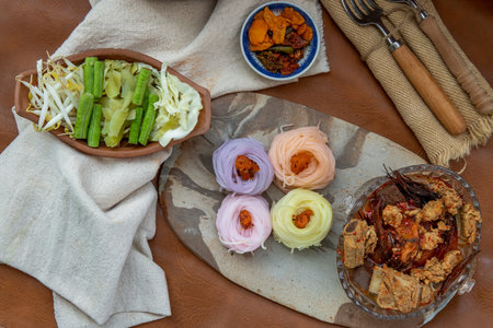 Rice noodles with spicy pork sauce or Nam ngiao Rice Noodle (Traditional Northern Thai Cuisine). Nam...