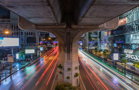 Bangkok, Thailand, Jul 03, 2020 : Street lighting in downtown area at Siam Square after the rain. Selective focus.のeditorial素材