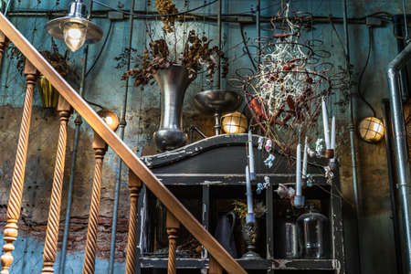 Bangkok, Thailand - Jun 26, 2020 : Interior design and decoration vintage style decorated with old brick wall and wooden staircase, Lamp and Dried flowers. No focus, specifically.のeditorial素材