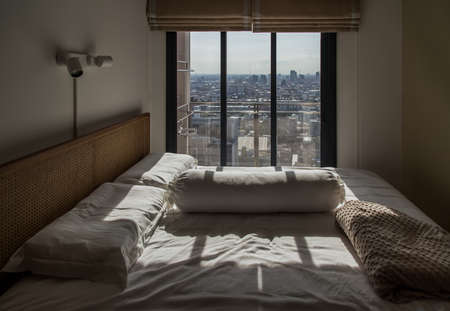 Detail of interior the living room at condominium with view city. Selective focus.の写真素材