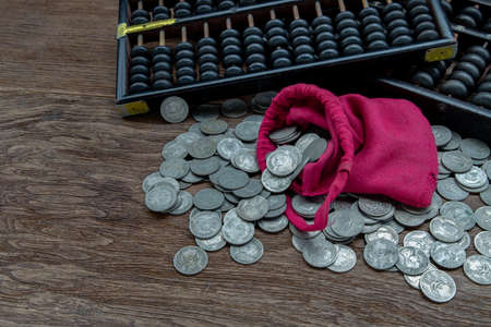 Dried flowers in Two ceramic vase on pink textured table cloth and vintage fan with Old cement wall. Home decor, Selective focus.の写真素材