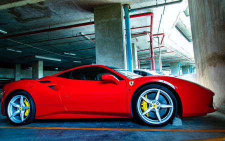 Bangkok, Thailand - 06 Jun 2021 : Close-up of Headlights, Wheel, and Rim of Black lamborghini sports car. Selective focus.のeditorial素材