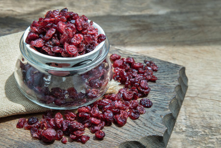 Pile of Walnuts kernels on old rustic wooden table. Copy space, Selective focus.の写真素材
