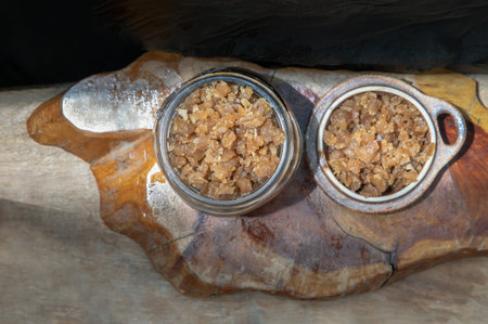 Shrimp paste with Dried shrimps in white Ceramic Bowl on Wooden plank. Top view, Copy space,...