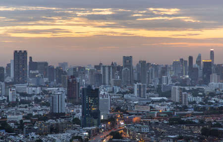 Bangkok, Thailand - Aug 08, 2021: Aerial view of Beautiful scenery view of Skyscraper Evening time Sunset creates relaxing feeling for the rest of the day. Selective focus.のeditorial素材