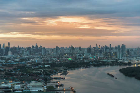 Bangkok, Thailand - Aug 08, 2021: Aerial view of Beautiful scenery view of Skyscraper Evening time Sunset creates relaxing feeling for the rest of the day. Selective focus.のeditorial素材