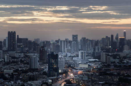 Bangkok, Thailand - Aug 08, 2021: Aerial view of Beautiful scenery view of Skyscraper Evening time Sunset creates relaxing feeling for the rest of the day. Selective focus.のeditorial素材