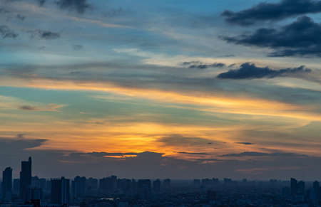 Bangkok, Thailand - Aug 08, 2021: Aerial view of Beautiful scenery view of Skyscraper Evening time Sunset creates relaxing feeling for the rest of the day. Selective focus.のeditorial素材