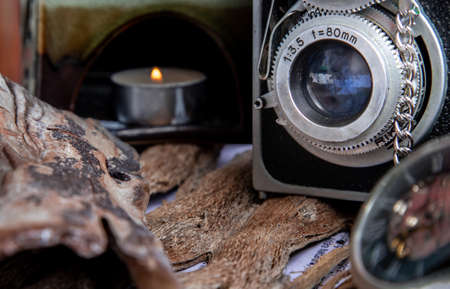 Vintage two lens photo camera on wooden background. An idea of old camera and memory, time Nostalgia.の写真素材