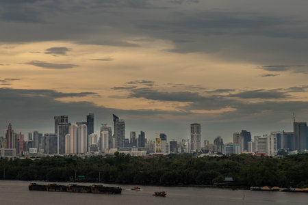 Bangkok, thailand - May 10, 2020 : Beautiful view of Bangkok city, Beauty skyscrapers along Chaopraya river in the evening, making the city modern style. Selective focus.のeditorial素材