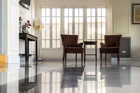 Phetchaburi, Thailand - Sep 18, 2021 : Modern interior design. White living room. chair, paintings, lamp, Decorations and elegant accessories in home decor. Selective focus.のeditorial素材