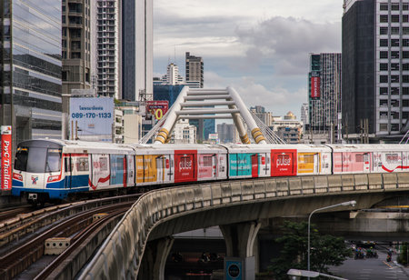 Bangkok, Thailand - Oct 03, 2020 :  BTS Sky Train is running in downtown pass through skycrapers business building in central business district of Bangkok. Selective focus.のeditorial素材