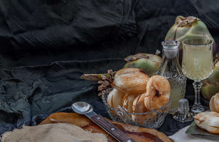 Peel toddy palm and fresh palm juice at front of dark background. Copy space, Selective Focus.の写真素材