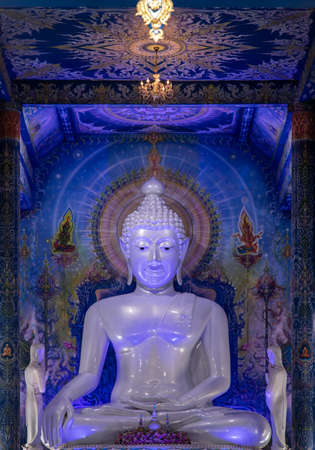 Chiang Rai, Thailand - Sep 05, 2020 : Beautiful Sculpture of white giant Buddha image inside the Buddhist church at Wat Rong Suea Ten Temple, also known as the Blue Temple, locate at Chiang Rai province, northern part of Thailand. Selective Focus.のeditorial素材
