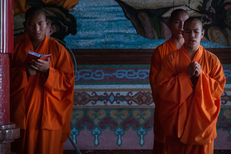 Bangkok, Thailand - 18 Aug 2019 : Chinese monks praying for buddhism worship inside Wat Bhoman Khunaram (Bhoman Khunaram Temple).のeditorial素材