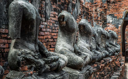 Aytthaya, Thailand, 22 Aug 2020 : Ancient old buddha statue sculpture is damaged at the old temple in Ayuthaya province. thailand, Selective focus.のeditorial素材