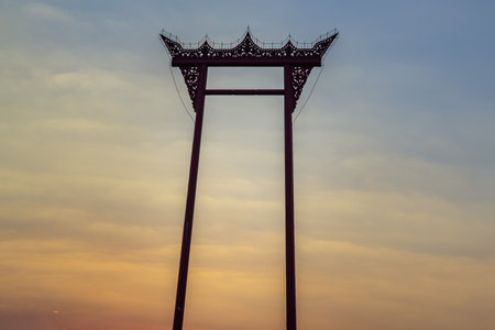 The Giant Swing or "Sao Chingcha" The architecture created for the ceremony of swinging in the royal ceremony of the tri-yam phai teripiwa of the Brahmin-Hindu religion. The famous landmark in Bangkok.の写真素材