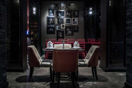 Bangkok, Thailand - Feb 16, 2020 : Interior of retro style restaurant with tables and chairs at shanghai mansion bangkok in yaowarat Rd.のeditorial素材