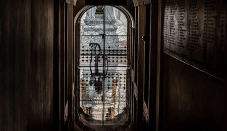 Bangkok, Thailand - Nov 23, 2019 : View from Loha Prasat Metal Palace at Ratchanaddaram temple through the gate. Loha Prasat Metal Palace is famous tourist destination in Bangkok, Thailand.のeditorial素材