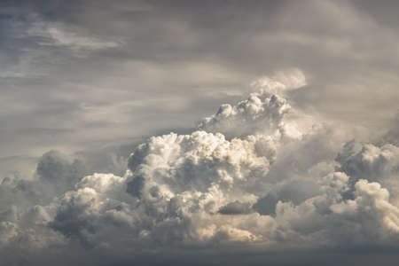 The sun shines through the clouds in the sky.  The shape of the clouds evokes imagination and creativity. They can be used as wallpapers that look amazing. Copy space, No focus, specifically.の写真素材