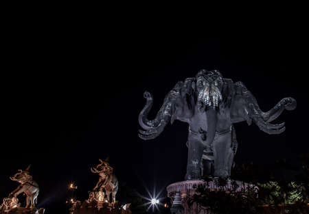 Samut Prakan, Thailand - 13 December 2019 : Erawan Museum is a Elephant head sculpture with 3 heads on dark night background, It is one of the important and unique tourist.のeditorial素材