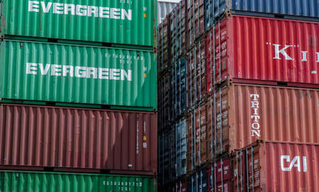 Bangkok,Thailand - May 20, 2021 : Industrial containers box for Logistic import export business concept. Stacked cargo containers in storage area. No focus, specifically.のeditorial素材