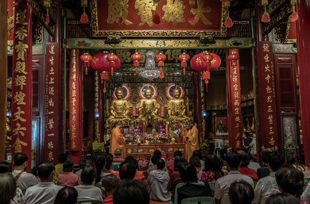 Bangkok, Thailand - 16 Feb 2020 : Chinese monks chanting mantras and doing rituals for buddhism worship inside Wat the Dragon Temple Kammalawat ( Wat Leng Noei Yi ). No focus, specifically.のeditorial素材