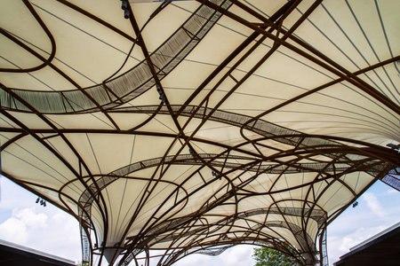 Bangkok, Thailand - 20 May 2021 : The pattern of steel frame umbrella underside detail with white...