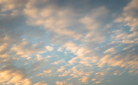 The cloudy beautiful sky with the light shining from the sun. The softness of the cloud creates a...