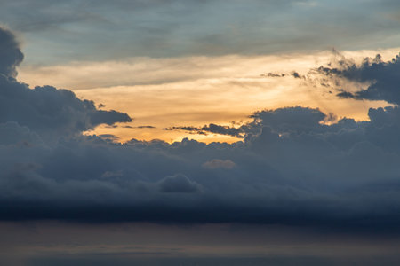 The cloudy beautiful sky with the light shining from the sun. The softness of the cloud creates a...