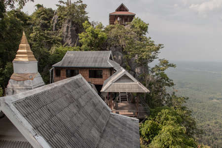 Lampang, Thailand - Sep 03, 2020 : Pagoda on top of the cliff high mountain at Chaloem Phrakiat Phrachomklao Rachanuson temple (Wat Phrabat Pu Pha Daeng) Chae-Hom District, Lampang province, Unseen and Amazing temple in Thailand. Selective focus.のeditorial素材