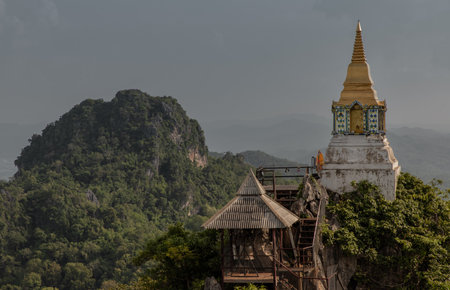 Lampang, Thailand - Sep 03, 2020 : Pagoda on top of the cliff high mountain at Chaloem Phrakiat Phrachomklao Rachanuson temple (Wat Phrabat Pu Pha Daeng) Chae-Hom District, Lampang province, Unseen and Amazing temple in Thailand. Selective focus.のeditorial素材