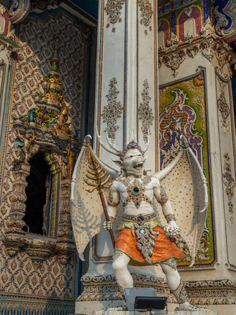 Bangkok, Thailand. Feb - 10, 2022 : Elaborate sculptures of monster is made of bricks and mortar,...