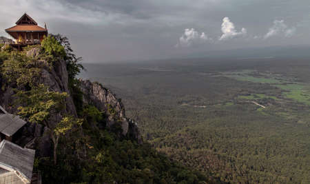 Lampang, Thailand - Sep 03, 2020 : Pagoda on top of the cliff high mountain at Chaloem Phrakiat Phrachomklao Rachanuson temple (Wat Phrabat Pu Pha Daeng) Chae-Hom District, Lampang province, Unseen and Amazing temple in Thailand. No focus, specifically.の写真素材