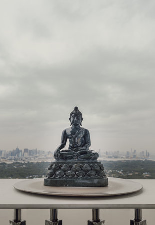 Figurine of Emerald lord buddha gautama or Siddhattha gotama buddha sculpture statue with nature background. Space for text, Selective focus.の写真素材