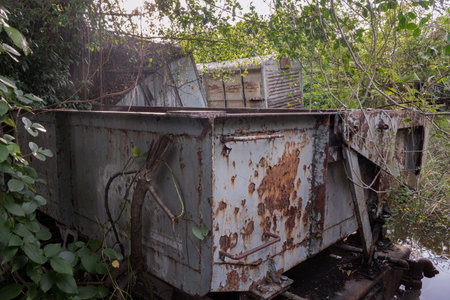 A batch of rusty vintage train carriages abandoned in the forest. Old train abandoned, Selective focus.の写真素材