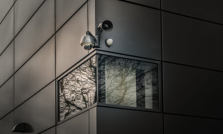Surveillance camera for mounted on outside wall of Modern building. The concept of surveillance and...