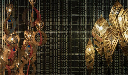 Bangkok,Thai - Apr 29, 2022 : Softly shining hanged lamps decor design with Braided Colorful Ropes...