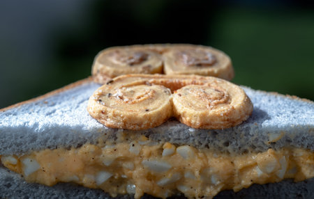 Close-up of White bean butterfly shaped breads put on Butterfly pea homemade Sandwich stuffed with...