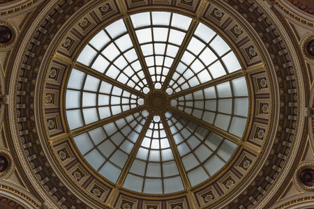 London, UK - Oct 31, 2023 - Light passes through The high ceiling glass dome inside main hall of The National Gallery. Ceiling dome architecture design of the skylight at The National Gallery is an Art Museum in Trafalgar Square, Look up, Space for text, Selective focus.の写真素材