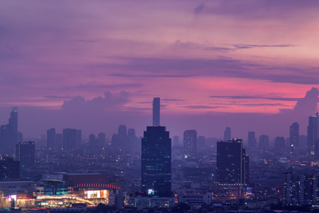 Bangkok downtown cityscape with skyscrapers at evening give the city a modern style. No focus, specifically.の写真素材