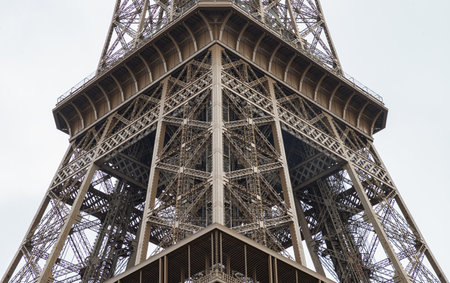 France, Paris - Jan 4, 2024 - Architectural detail design of the famous Eiffel Tower iron structure. Close-up of the framework of the Eiffel Tower in Paris, France, Space for text, Selective focus.のeditorial素材