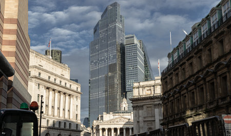 London, UK - Feb 27, 2024 - View of Bank of England, Royal Exchange with skyscrapers in background of the City of London. Space for text, Selective focus.のeditorial素材