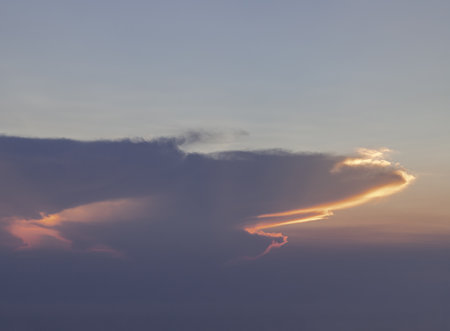 Evening sky scene with light from the setting sun, Last light of the day, The Stunning Beauty of a Sunset, Evening warm Sun, Dramatic sunset, They can be used as Wallpaper that Look Amazing, Space for text, Selective focus.の写真素材
