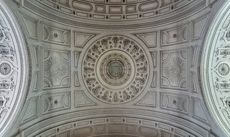 Munich, Germany - Dec 21, 2023 - Decorative sculptures on ceiling interior the St. Michael's Church (Michaelskirche Jesuit church) in Munich. Space for text, Selective focus.のeditorial素材