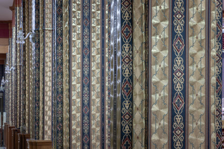Bangkok, Thailand - May 22, 2024 - Wallpaper pattern on Pillars with lantern inside Monastery at Thai temple. Space for text, Selective focus.のeditorial素材